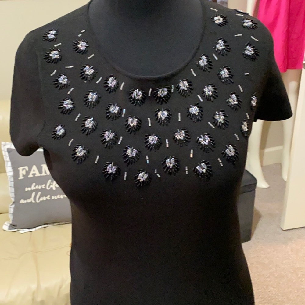 Beautiful lil black top with pretty embellishments